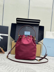 PRADA 25S DUET BUCKET BAG 23 IN BURGUNDY RE-NYLON GOLD HARDWARE