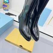 PRADA 25S CHUNKY SOLE TALL BOOTS MARTIN 50MM IN BLACK GLOSSY CALFSKIN