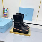 PRADA 25S HIGH MARTIN BOOTS 50MM IN BLACK CALFSKIN