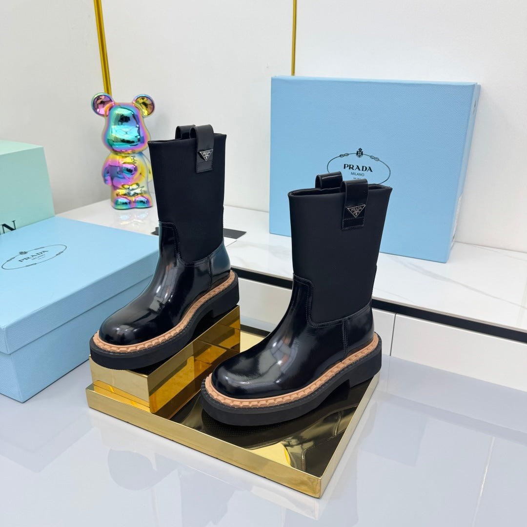 PRADA 25S HIGH MARTIN BOOTS 50MM IN BLACK GLOSSY CALFSKIN