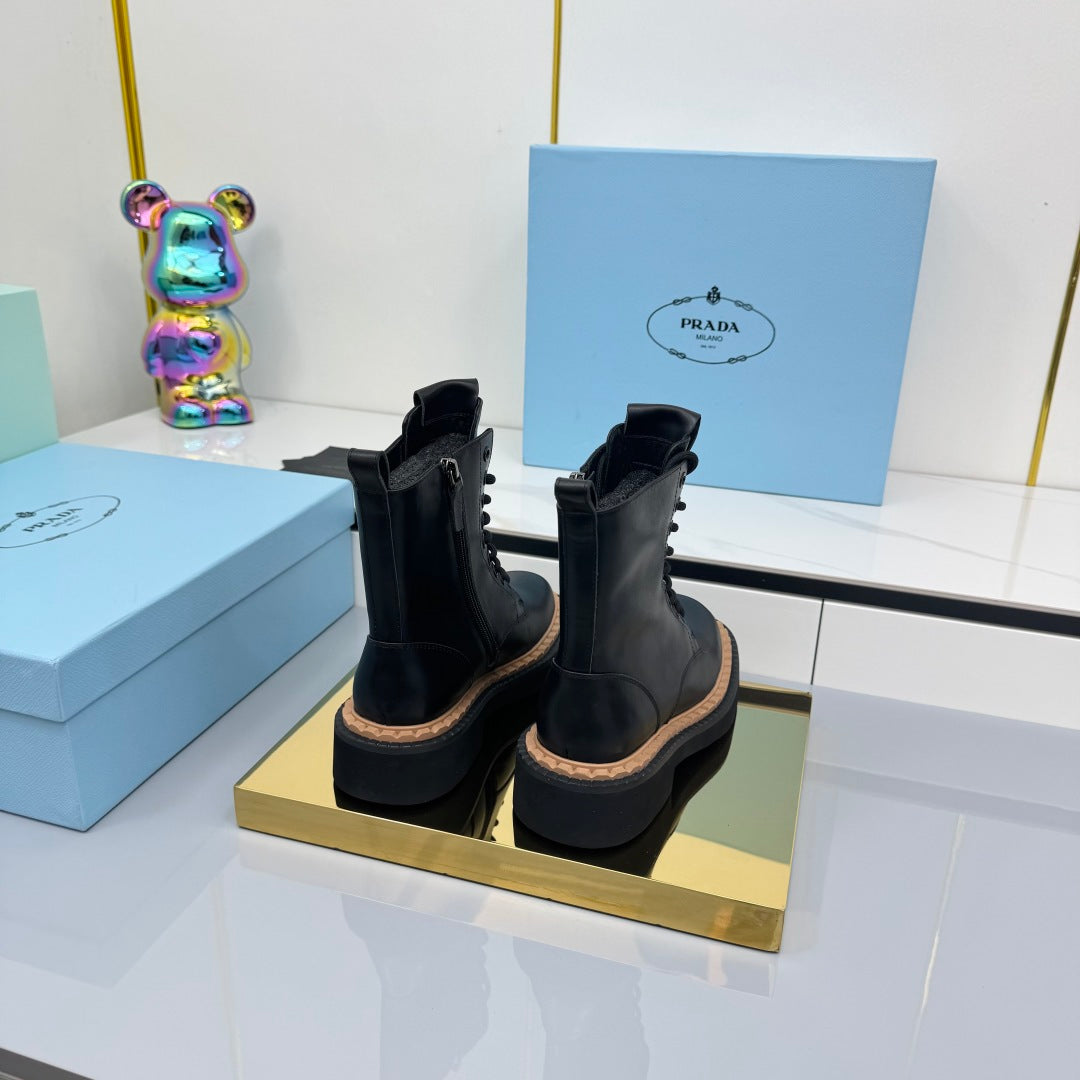 PRADA 25S LONG THICK SOLED MARTIN BOOTS 50MM IN BLACK CALFSKIN
