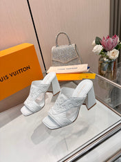LV 26S HIGH-HEELED SANDALS 90 MM IN WHITE CALFSKIN