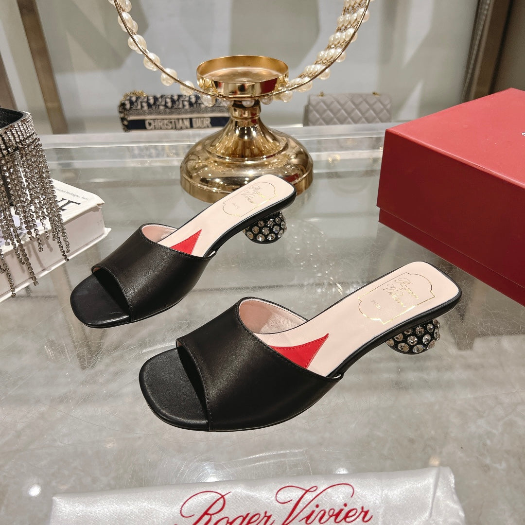 CRYSTAL HEEL MULE IN BLACK CALFSKIN