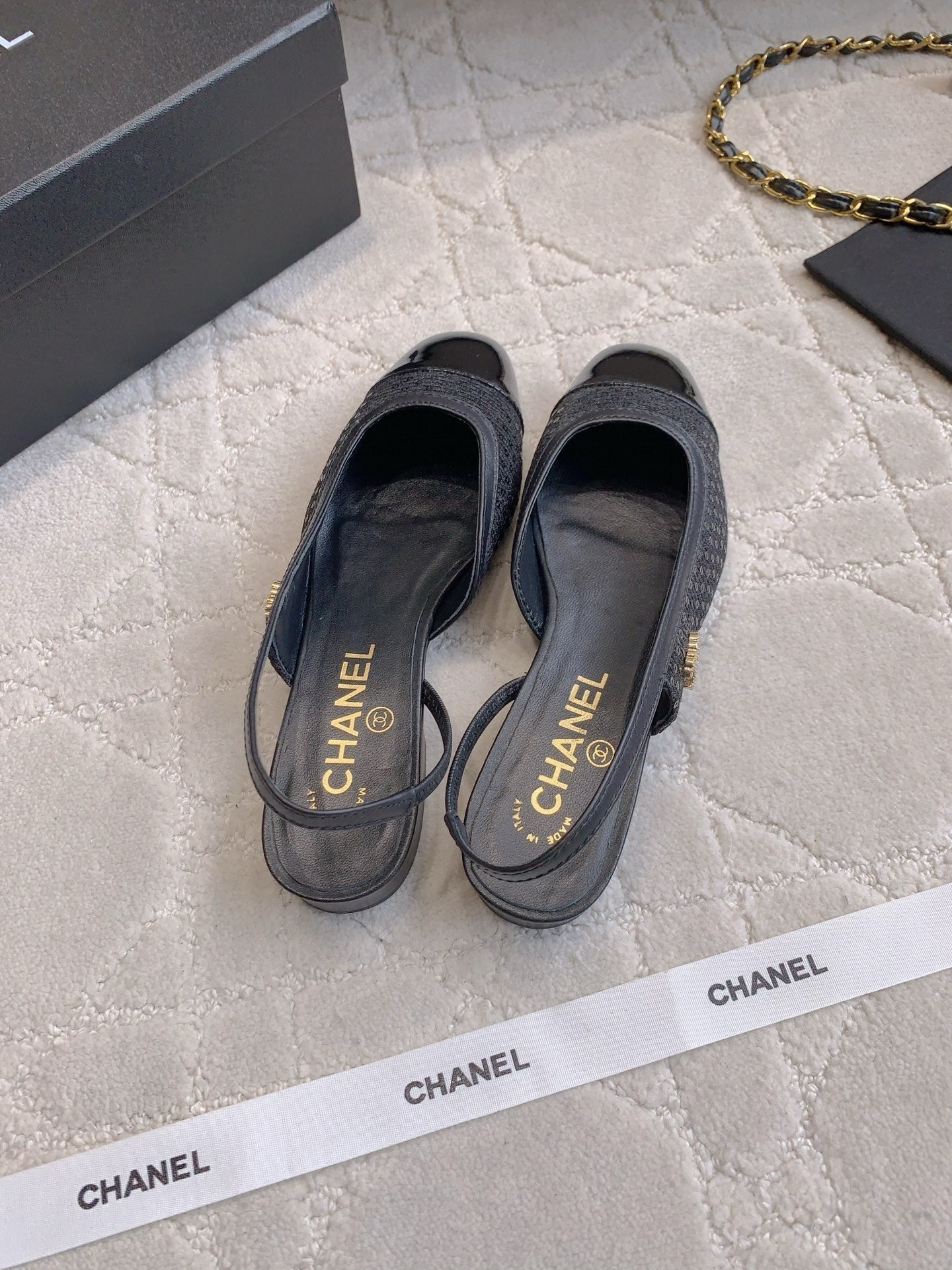 CHANEL 25S SLINGBACK IN SPARKLING BLACK CALFSKIN AND CANVAS GOLD HARDWARE