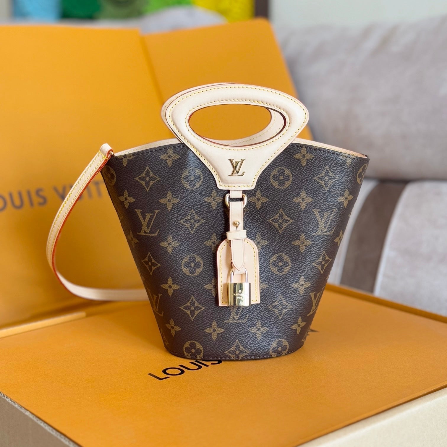 LV 25S RIVAGE BB 18 IN BROWN MONOGRAM CANVAS AND CALFSKIN GOLD HARDWARE