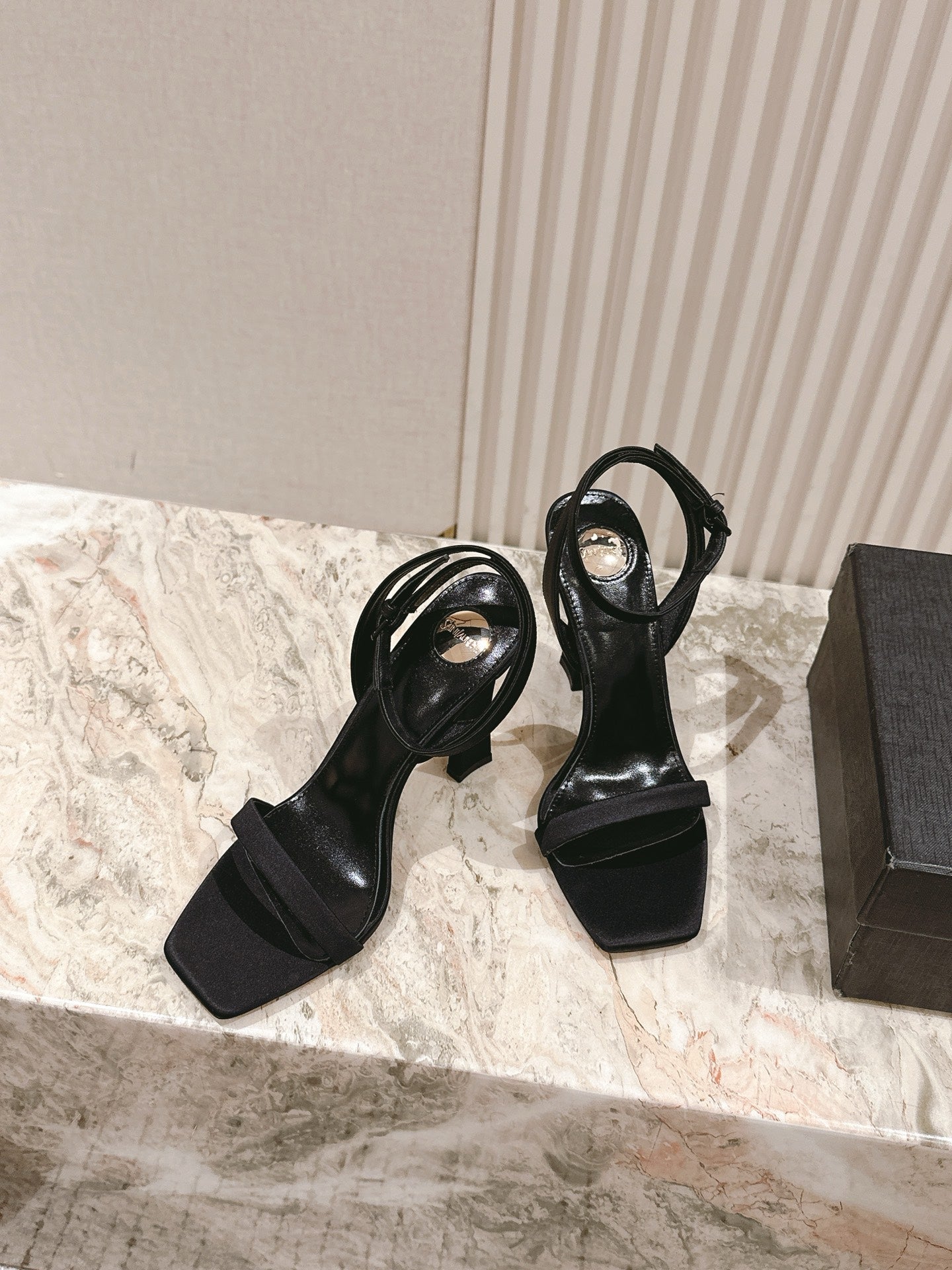 YSL 25S HIGH-HEEL SANDALS 100 MM IN BLACK SATIN