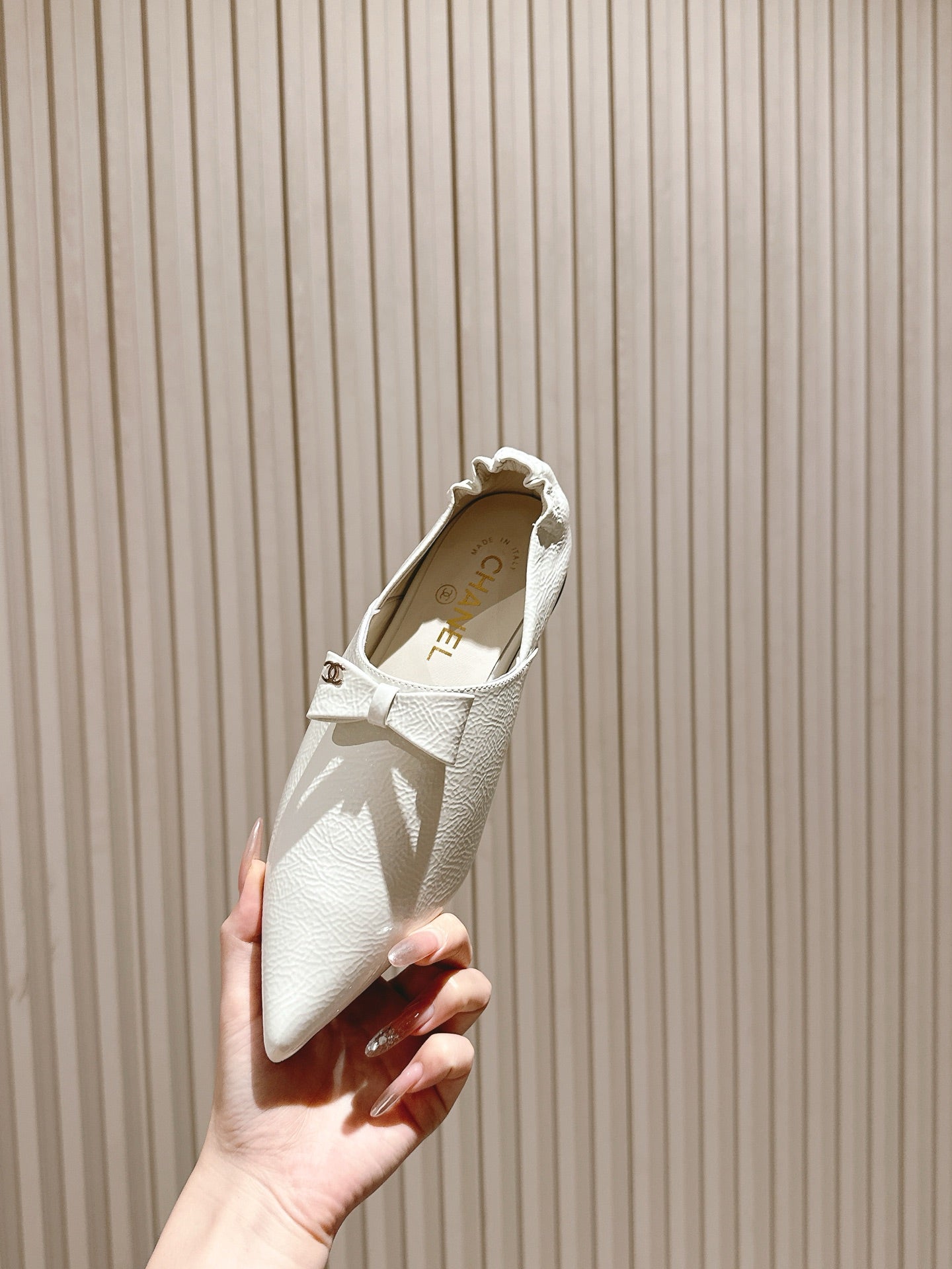 CC FLATS 25S IN WHITE PATENT LEATHER