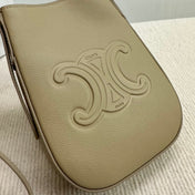 PHONE POUCH HELOISE 19 IN DONKEY BROWN SUPPLE CALFSKIN