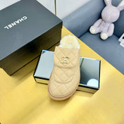THICK-SOLED SLIDE IN LIGHT YELLOW LAMBSKIN AND WOOL LINING