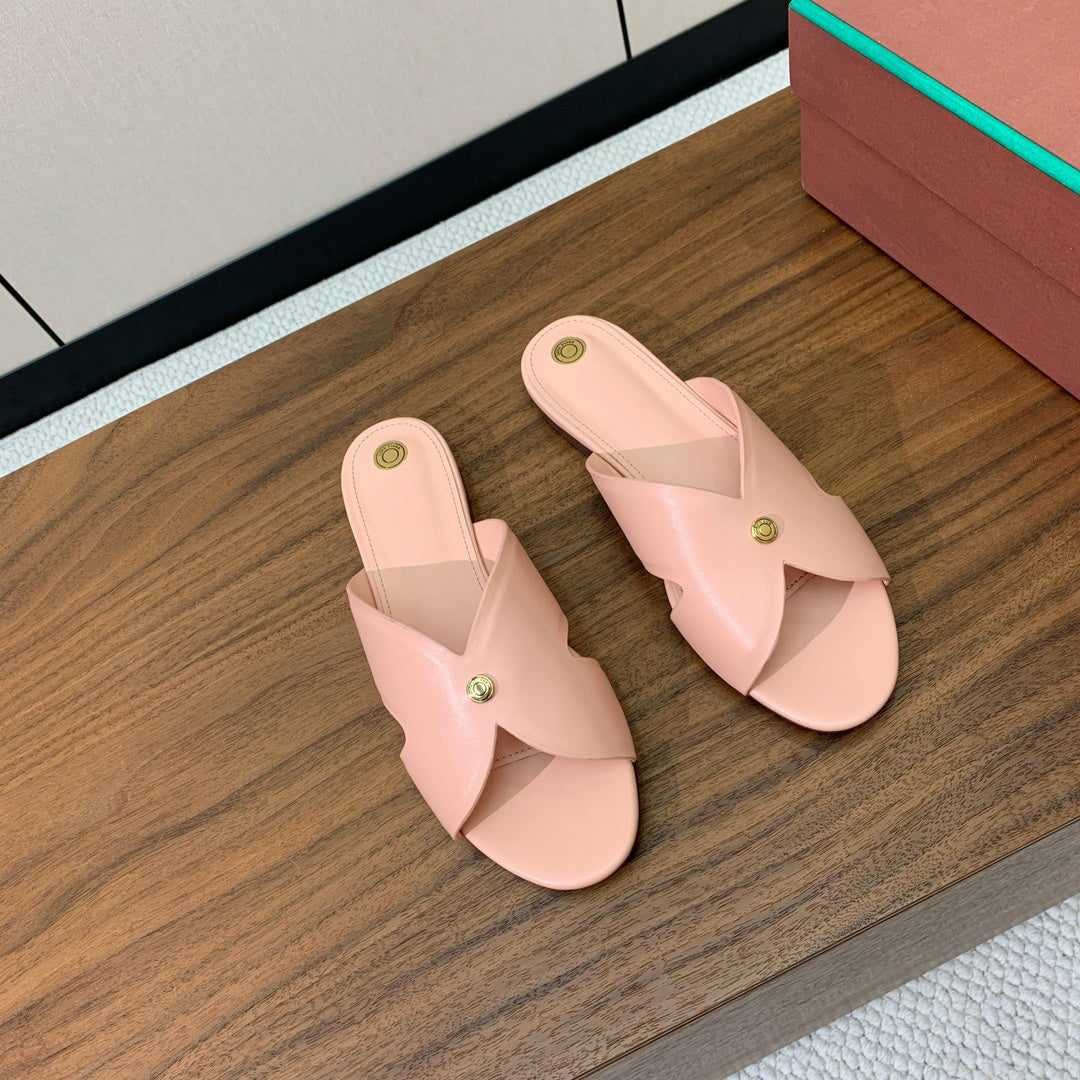 FLAT SLIPPERS IN LIGHT PINK CALFSKIN