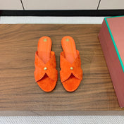 FLAT SLIPPERS IN ORANGE SUEDE