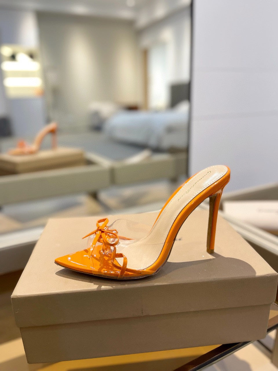 GIANVITO ROSSI 26S HEELED SANDALS 105 MM IN ORANGE PATENT CALFSKIN WITH BOW