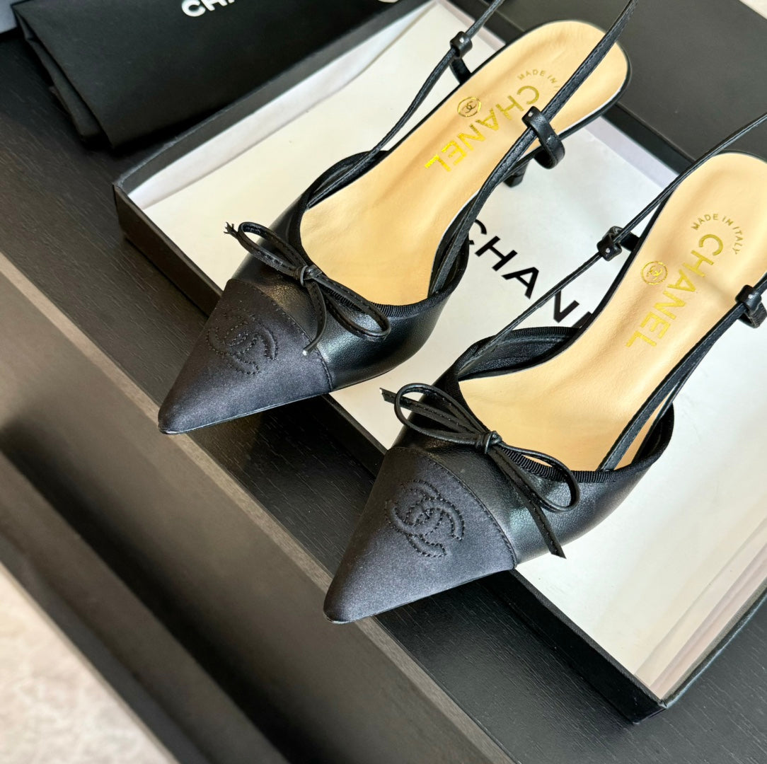 SLINGBACK WITH BOW IN BLACK LAMBSKIN