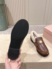 MIUMIU 25S PENNY LOAFERS 20MM IN EBONY BROWN BLEACHED CALFSKIN WITH SHEARLING