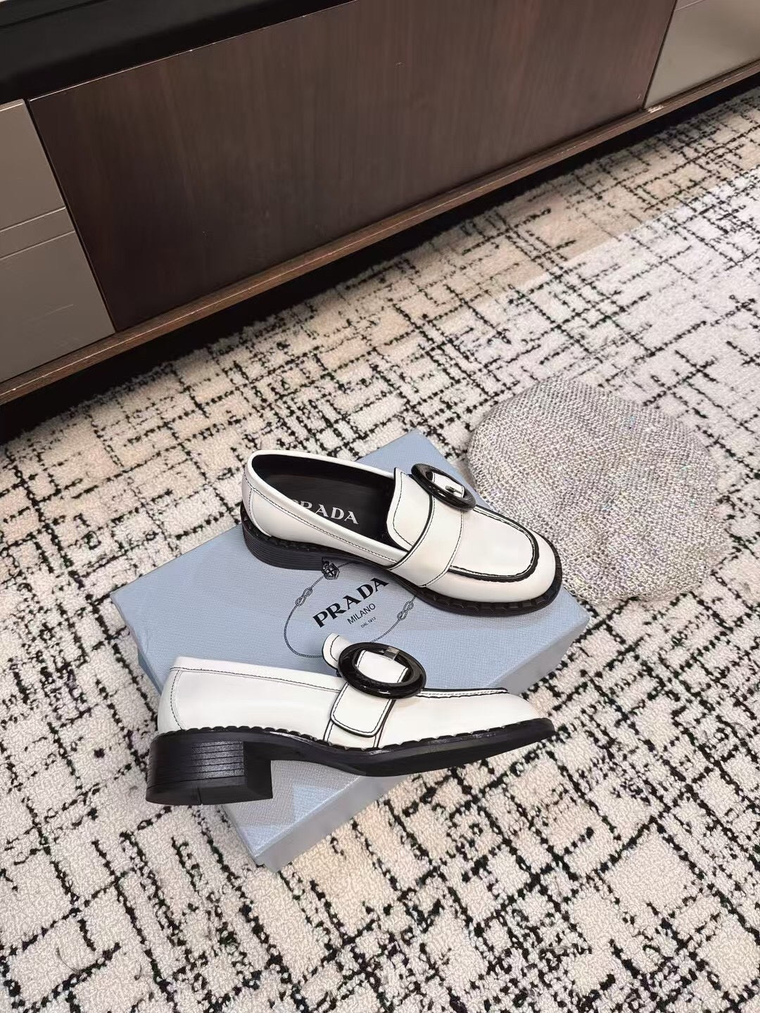 PRADA 26S BUCKLED LOAFERS IN WHITE CALFSKIN