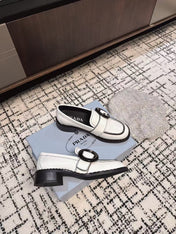 PRADA 26S BUCKLED LOAFERS IN WHITE CALFSKIN