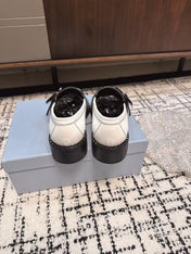 PRADA 26S BUCKLED LOAFERS IN WHITE CALFSKIN