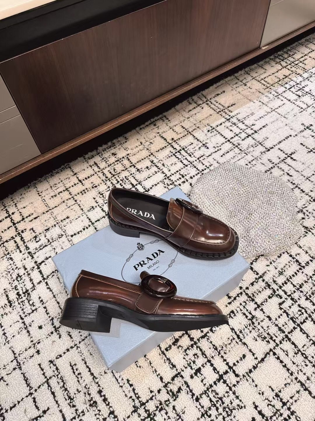 PRADA 26S BUCKLED LOAFERS IN DARK BROWN SHINY CALFSKIN