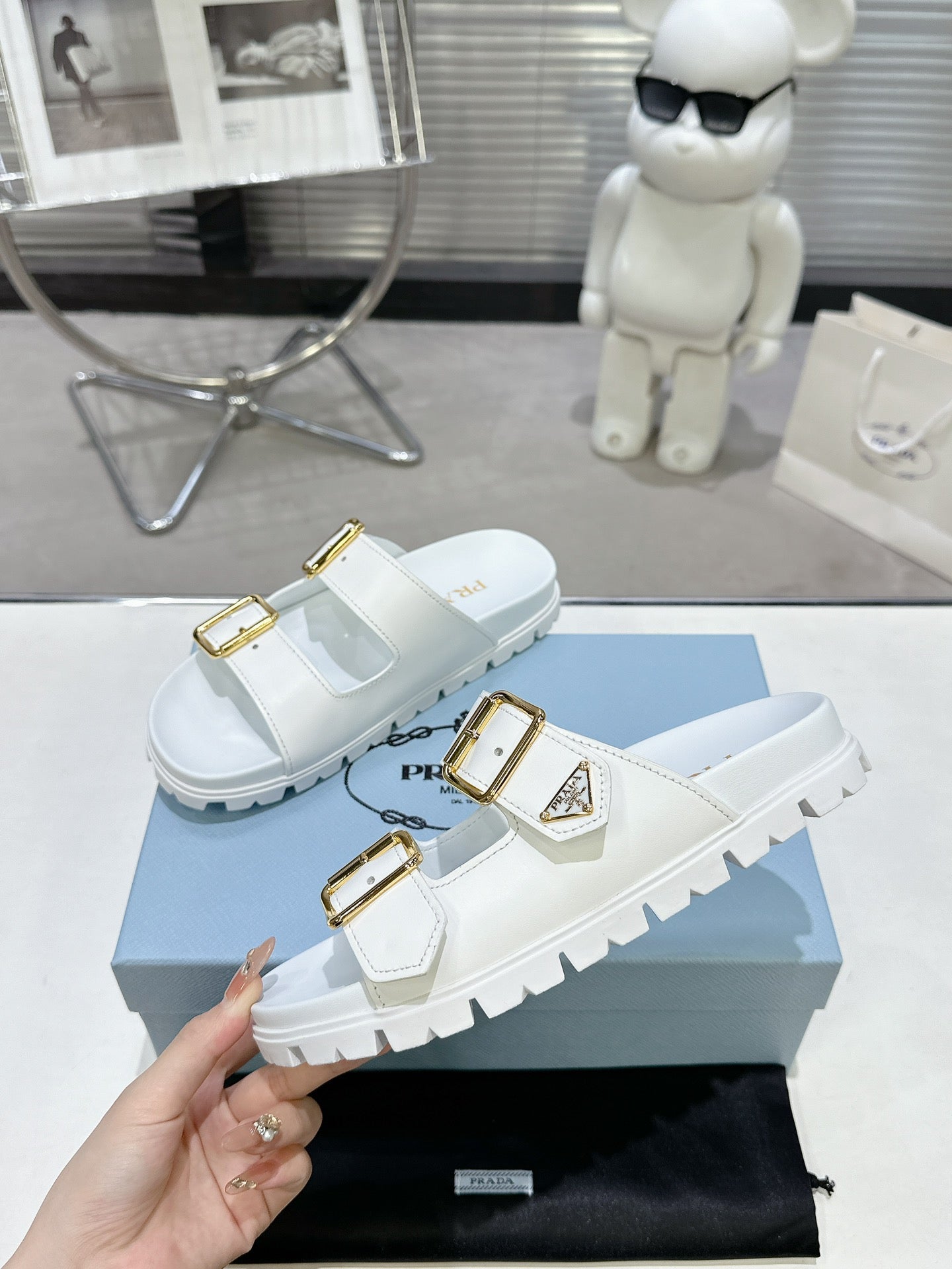 PRADA 25S STRAP SLIDES 30MM IN WHITE CALFSKIN GOLD HARDWARE