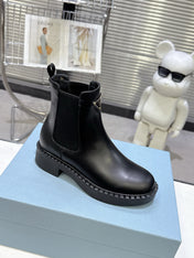 PRADA 25S RETRO PLATFORM MARTIN BOOTS IN BLACK CALFSKIN