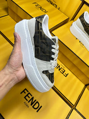 FENDI THICK-SOLDED SNEAKER IN WHITE SUEDE AND BROWN MONOGRAM FABRIC