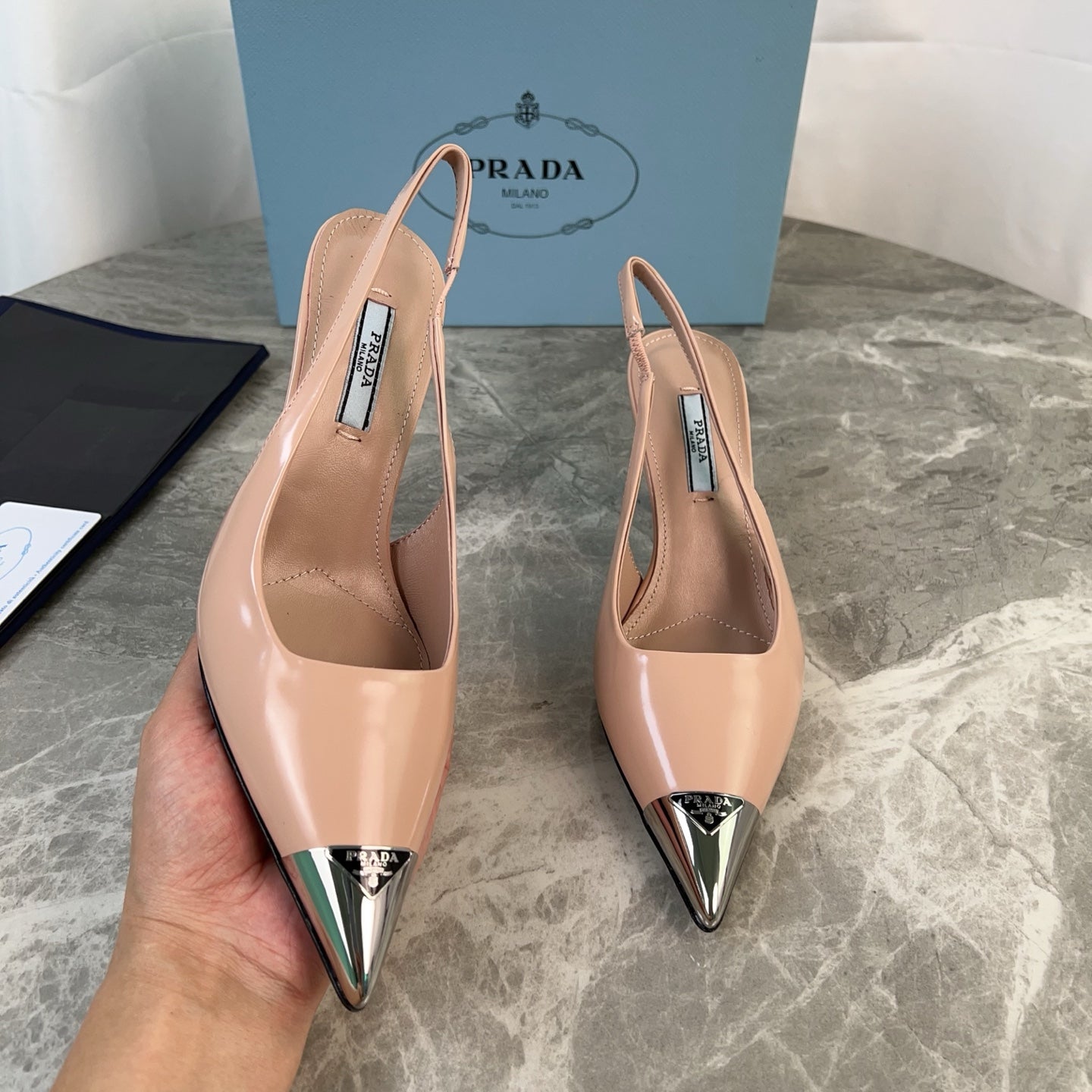 PRADA 25S METAL-TOE SLINGBACK PUMPS IN WARM BEIGE CALFSKIN