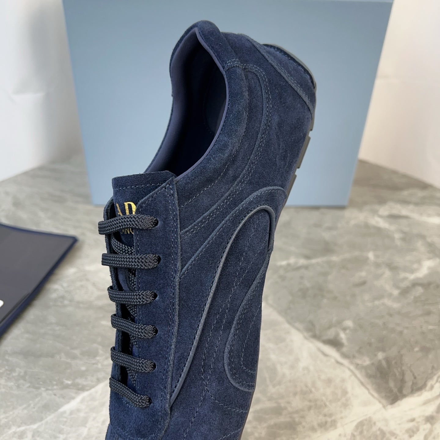 PRADA 25S MONTECARLO ANTIQUED SNEAKERS IN NAVY BLUE SUEDE