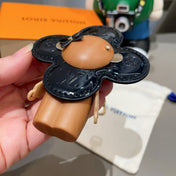 LV KEYCHAIN IN BLACK CALFSKIN AND WOOD