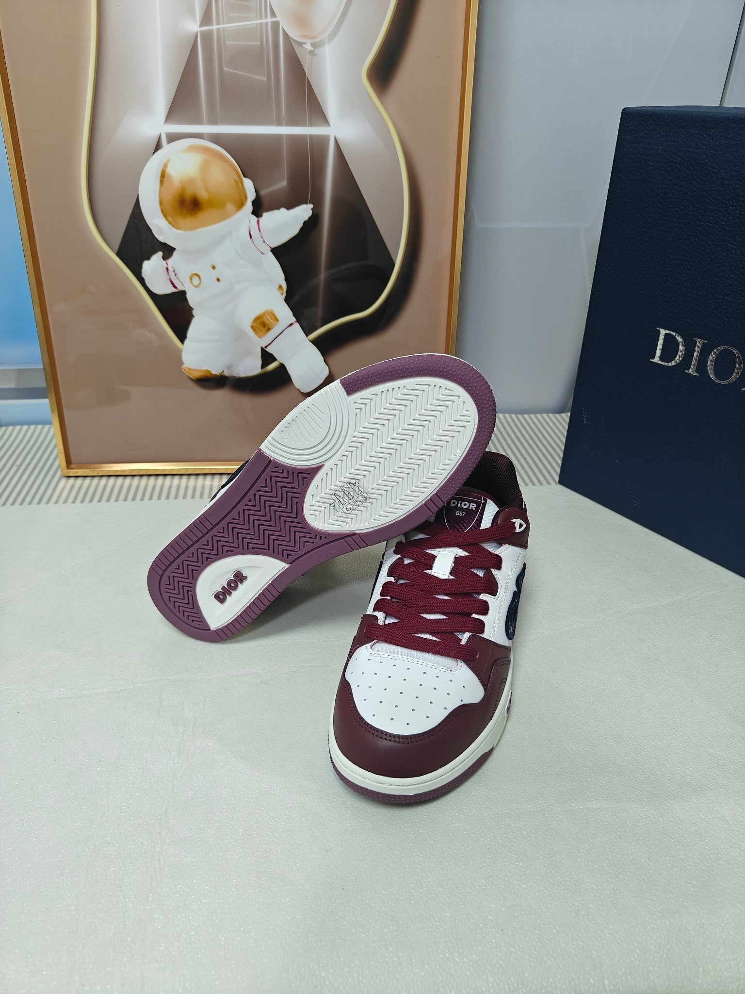 DIOR 26S LOW-TOP SNEAKER IN WHITE AND BURGUNDY RED CALFSKIN
