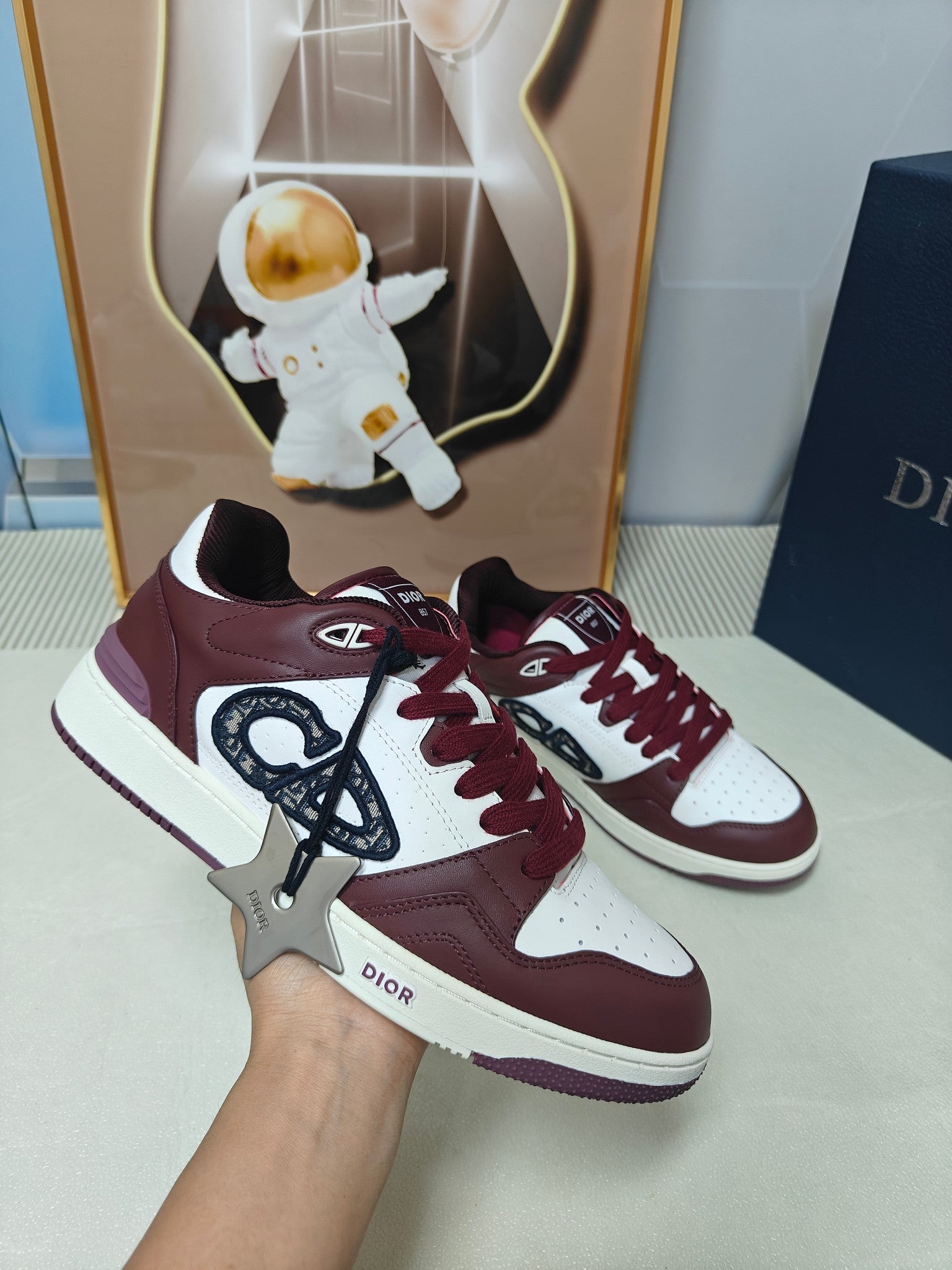 DIOR 26S LOW-TOP SNEAKER IN WHITE AND BURGUNDY RED CALFSKIN