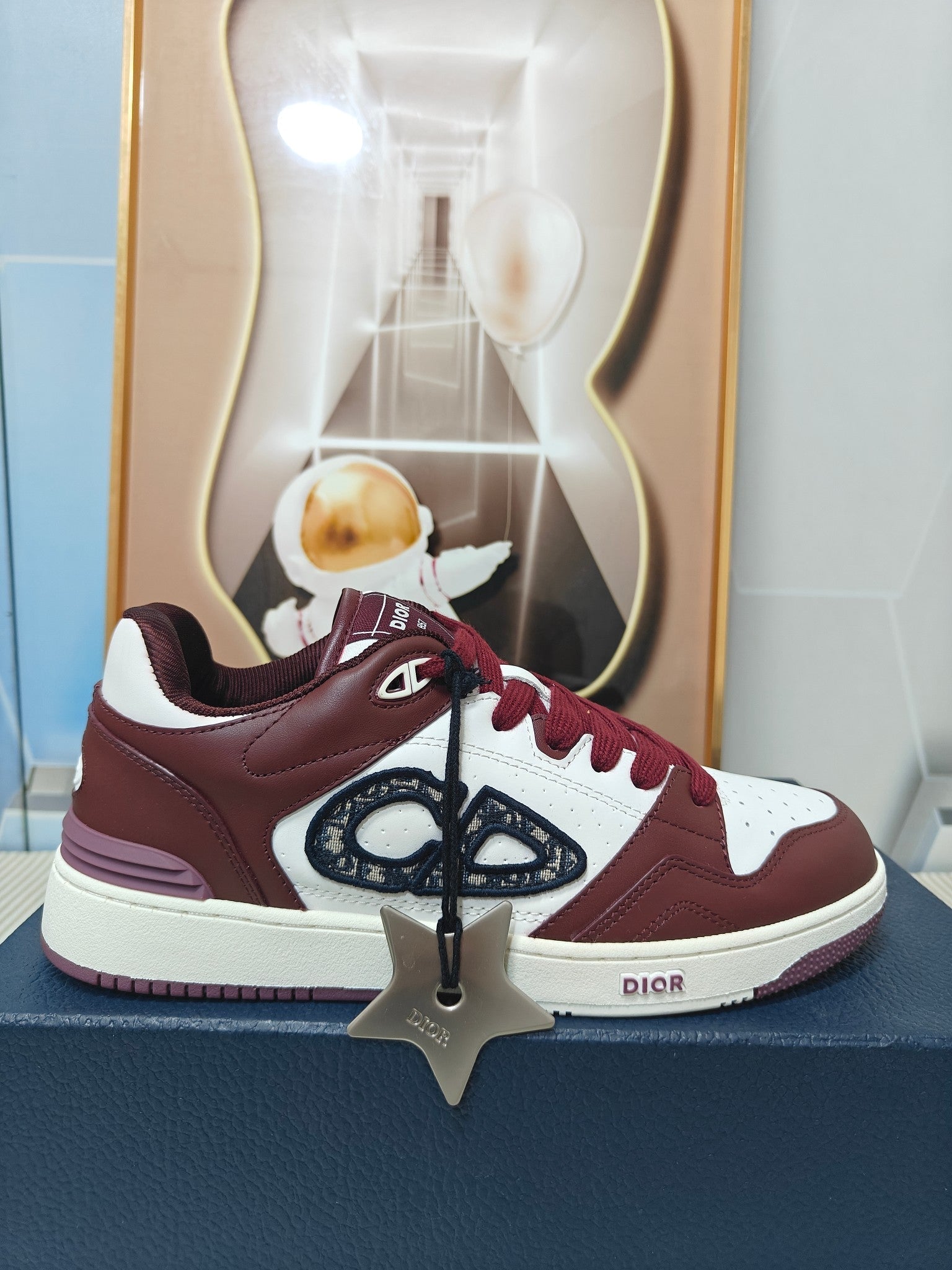 DIOR 26S LOW-TOP SNEAKER IN WHITE AND BURGUNDY RED CALFSKIN