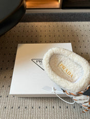 PRADA 26S WOVEN MULES IN IVORY SUEDE AND WOOL