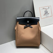 HERBAG A DOS ZIP RETOURNE BACKPACK 29 IN BROWN CANVAS AND BLACK CALFSKIN