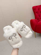BALENCIAGA 25S SOFT FUR SLIPPERS IN WHITE FUR WITH RHINESTONE BOW