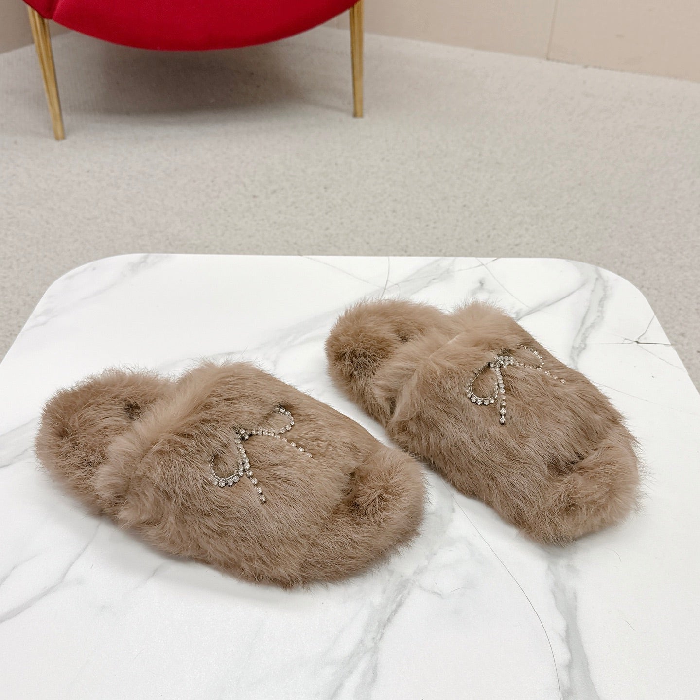 BALENCIAGA 25S SOFT FUR SLIPPERS IN LIGHT BROWN FUR WITH RHINESTONE BOW