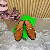 OPEN-BACK LOAFER REALISED IN CINNAMON BROWN SUEDE WITH SIGNATURE METALLIC KNOT DETAIL