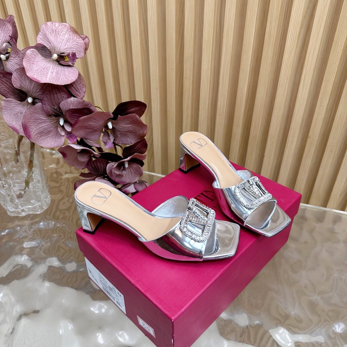 VALENTINO 25S HIGH-HEEL MULES 60 MM IN SILVER PATENT CALFSKIN WITH CRYSTAL-EMBELLISHED STRAP