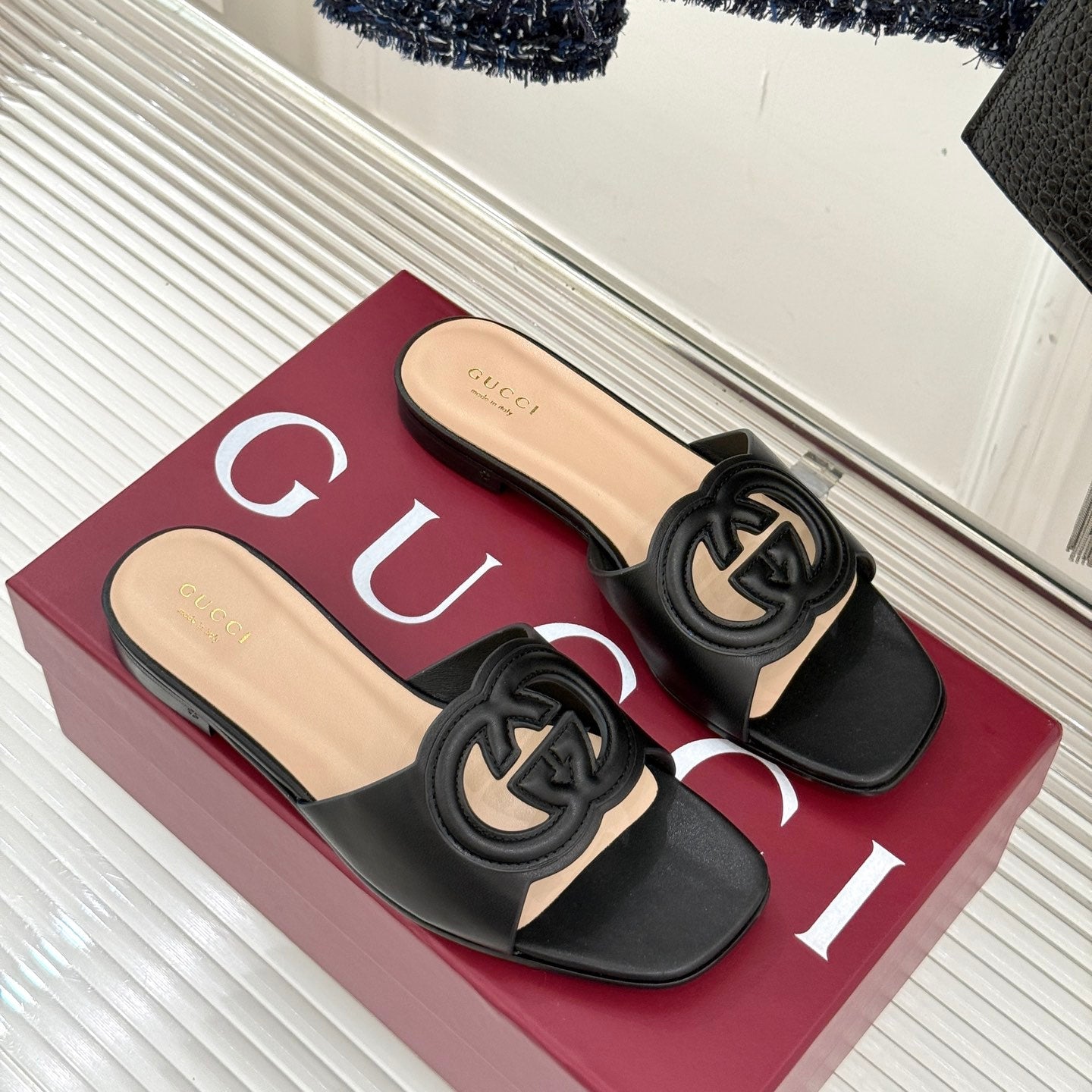 SLIDE SANDALS IN BURNT BLACK CALFSKIN