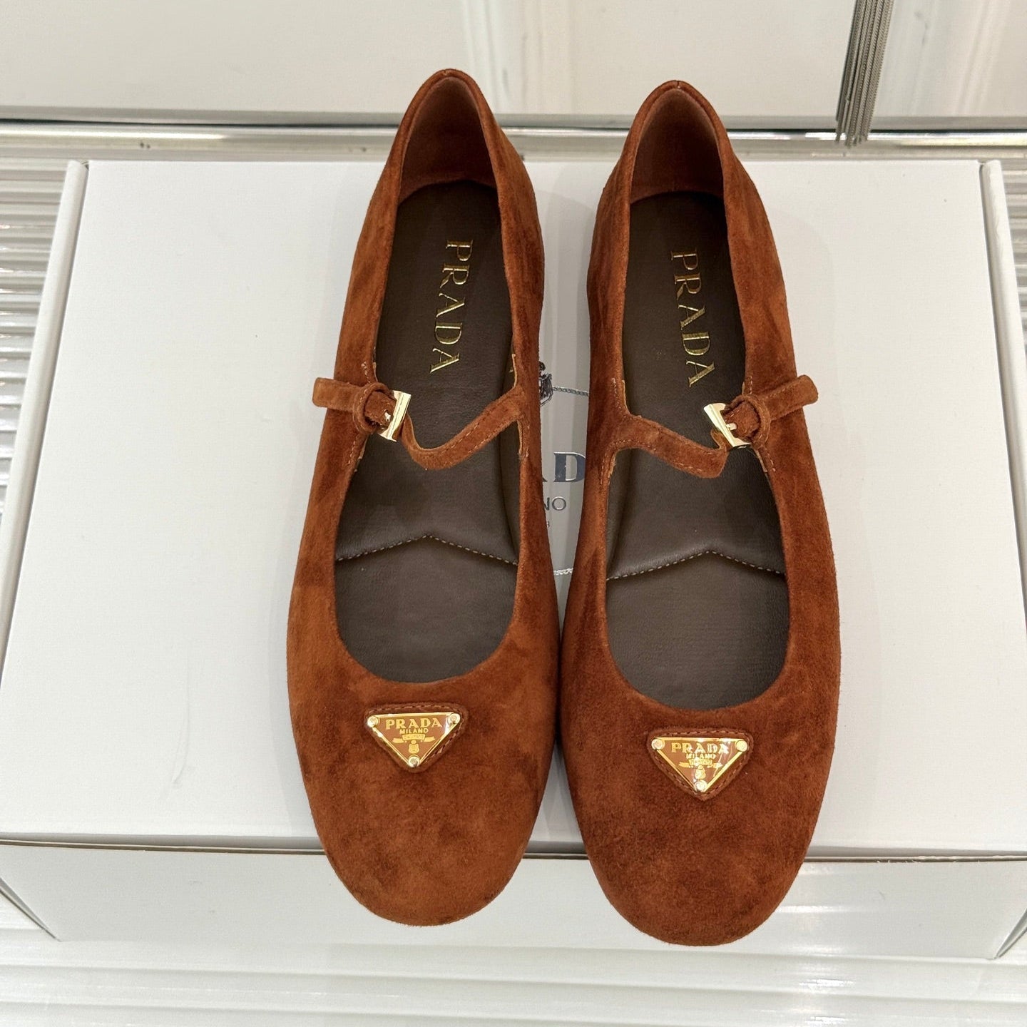 PRADA 25S SOFT PADDED BALLERINAS IN BURNT ORANGE SUEDE