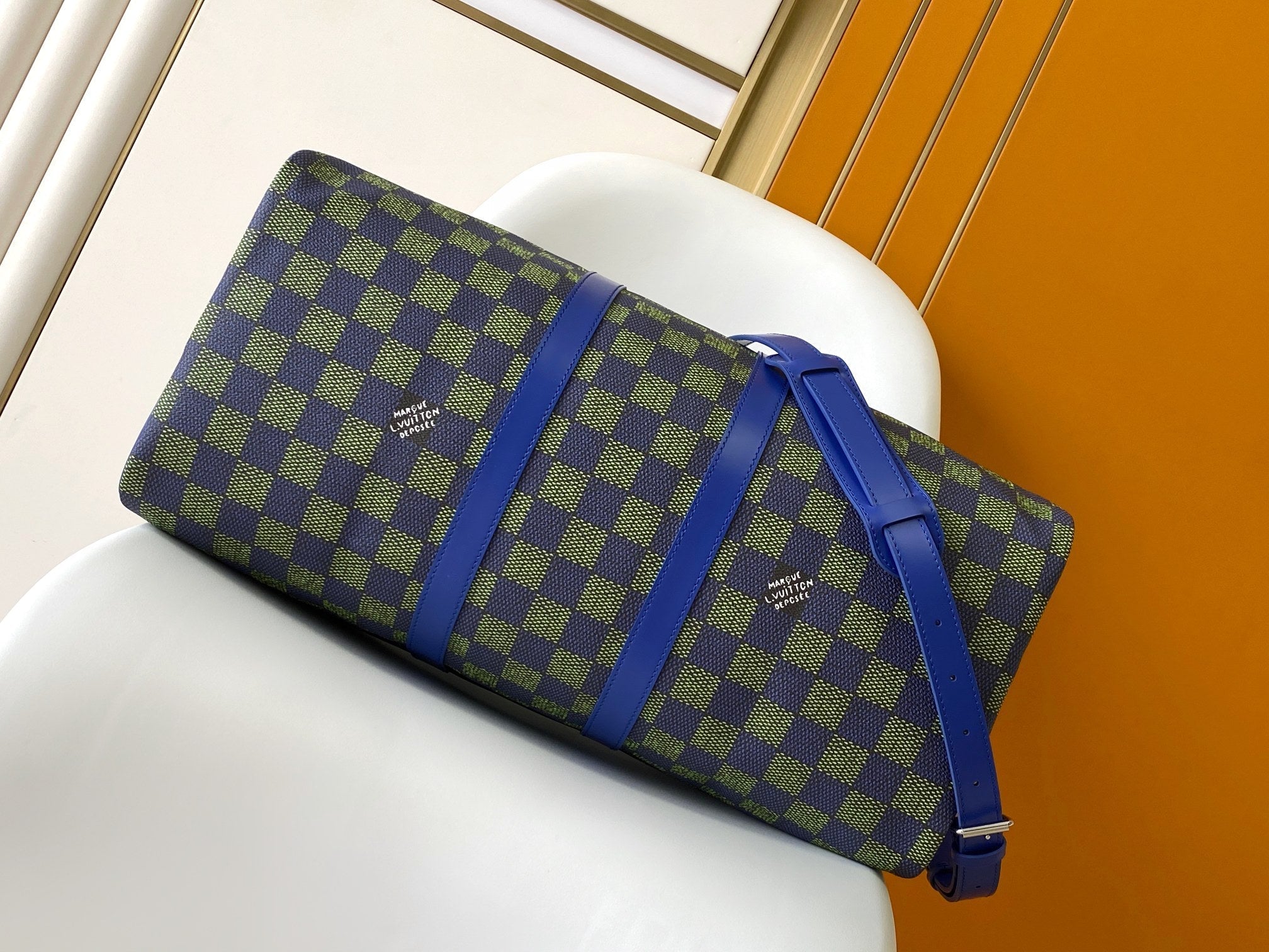 KEEPALL BANDOULIÈRE 50 IN BLUE GREEN DAMIER HERITAGE COATED CANVAS