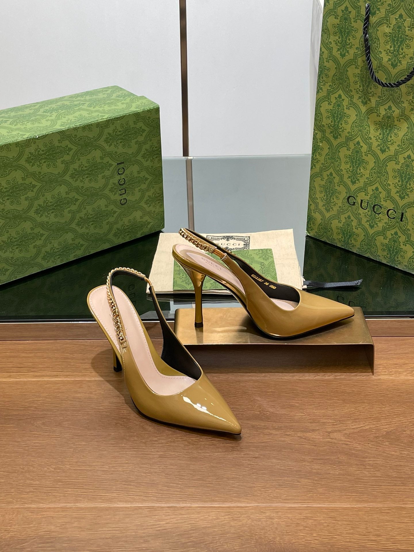 GG HIGH SLINGBACK 10.5 CM IN DIJON YELLOW GLOSSY CALFSKIN WITH GOLD HARDWARE