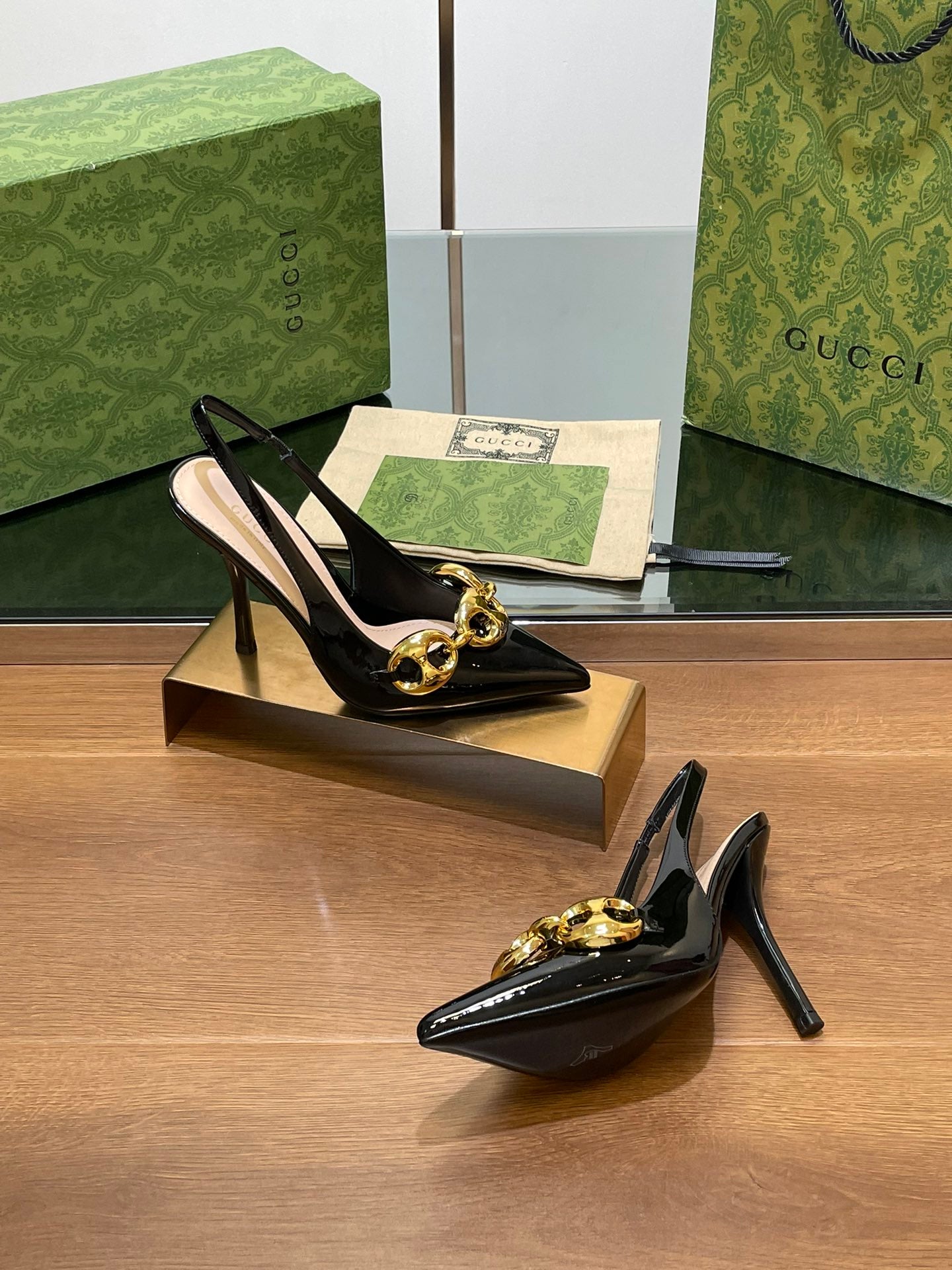 GG HIGH SLINGBACK 10.5 CM IN BLACK GLOSSY CALFSKIN WITH GOLD HARDWARE