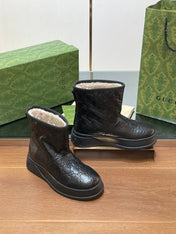 GG UGG BOOTS IN BLACK EMBOSSED SUEDE AND BEIGE WOOL LINING