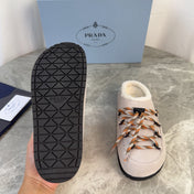 PRADA 26S WOVEN MULES IN LIGHT GREYISH BEIGE SUEDE
