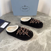 PRADA 26S WOVEN MULES IN BLACK SUEDE