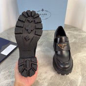 PRADA 26S HEELED LOAFERS 85 MM IN BLACK SMOOTH CALFSKIN