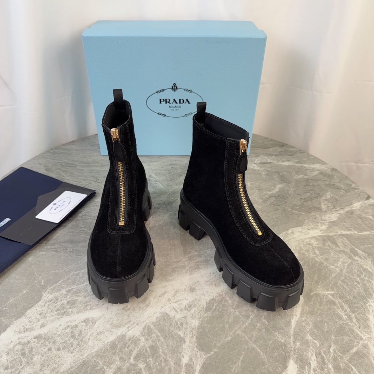 PRADA 26S ZIP-UP ANKLE BOOTS IN BLACK SUEDE