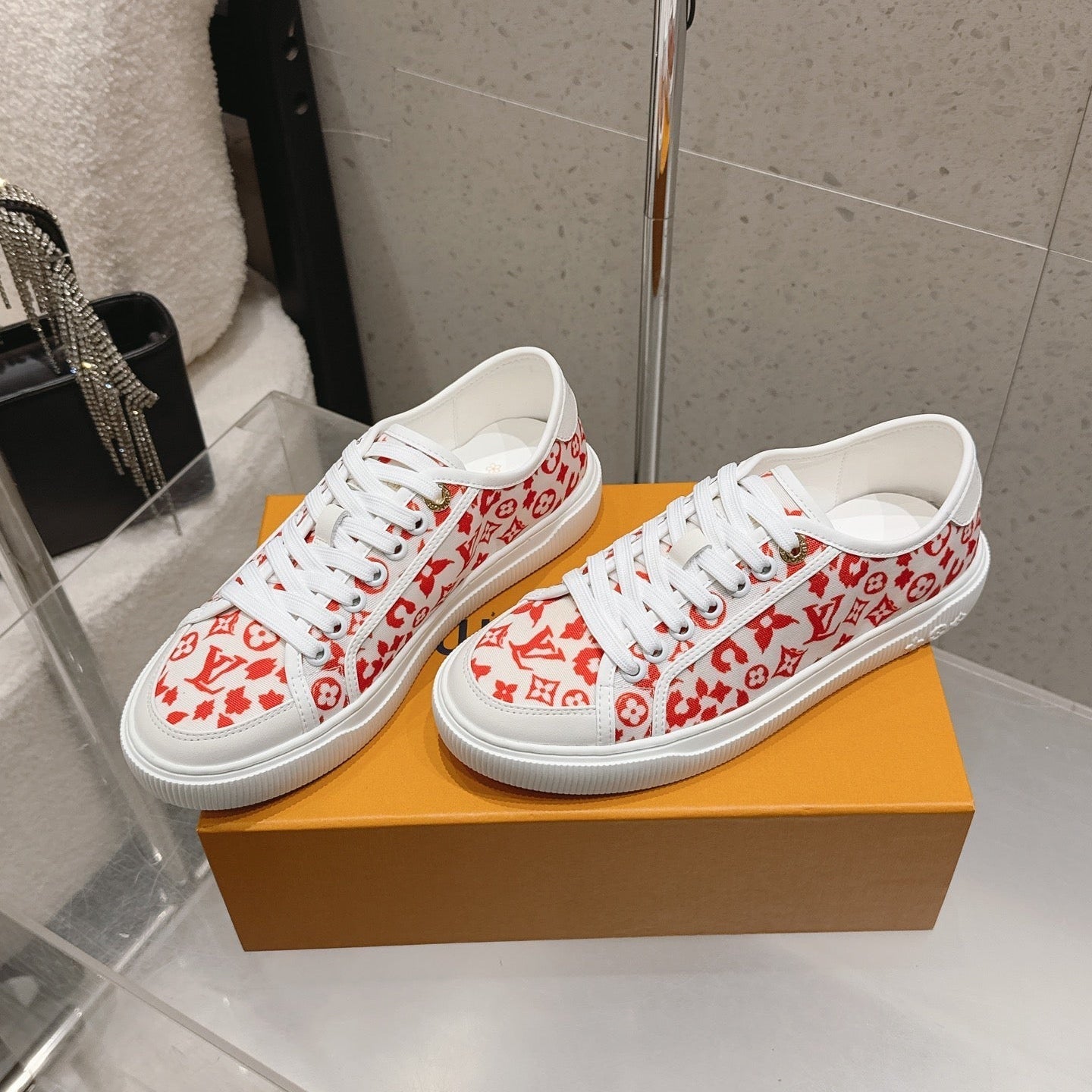 LV 26S LOW TOP SNEAKERS IN RED MONOGRAM CANVAS AND WHITE CALFSKIN TRIM