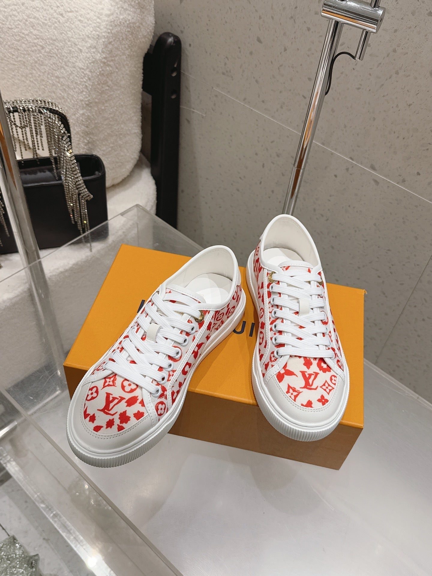 LV 26S LOW TOP SNEAKERS IN RED MONOGRAM CANVAS AND WHITE CALFSKIN TRIM