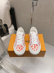 LV 26S LOW TOP SNEAKERS IN RED MONOGRAM CANVAS AND WHITE CALFSKIN TRIM